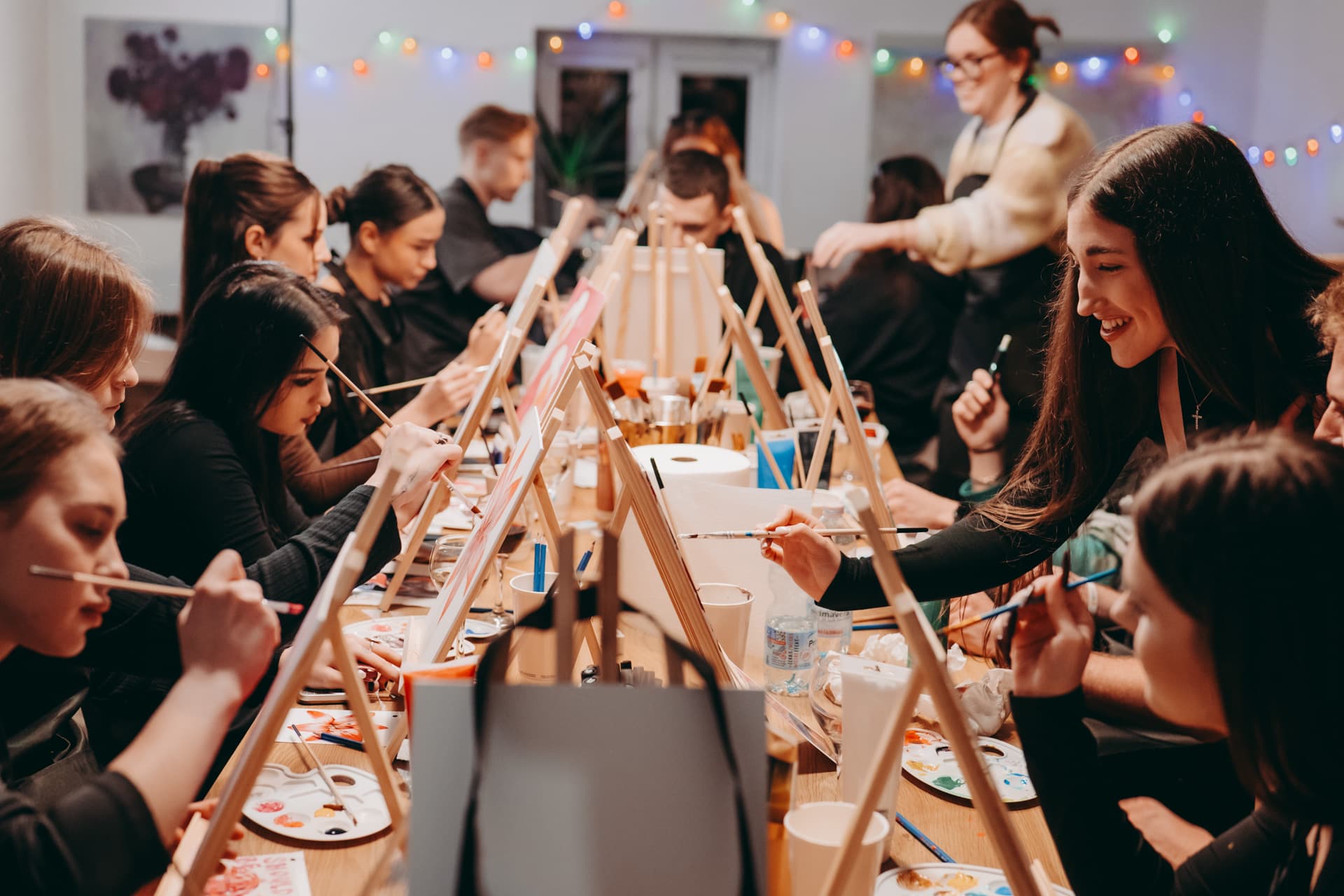 Guests painting in the studio